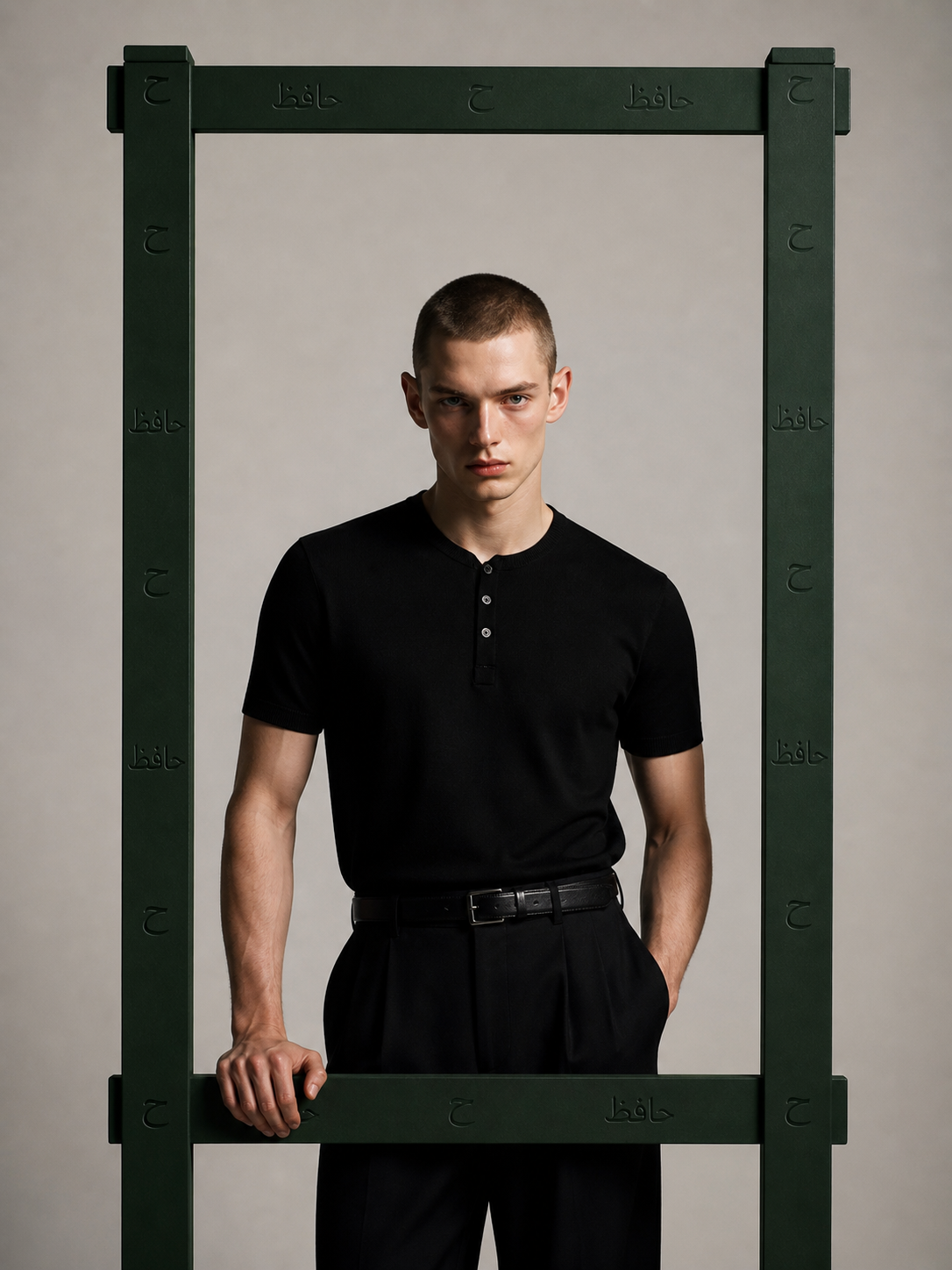 HAFEZ — man in black henley framed by the HAFEZ mark